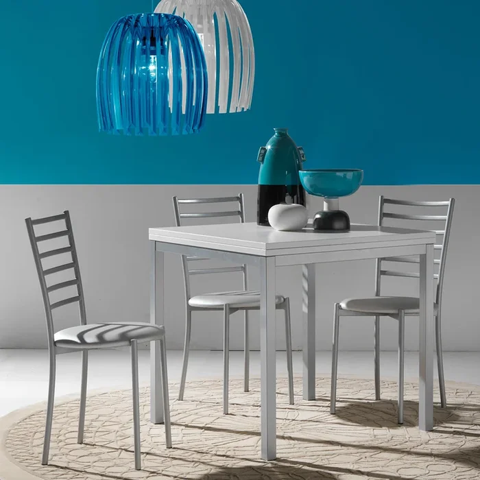 Clint – Tavolo quadrato allungabile in metallo e piano bianco apertura a libro cm 80/160x80x77h